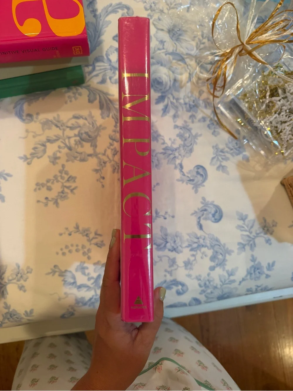 Impact: 50 Years Hardcover Coffee Table Book - Hot Pink & Gold